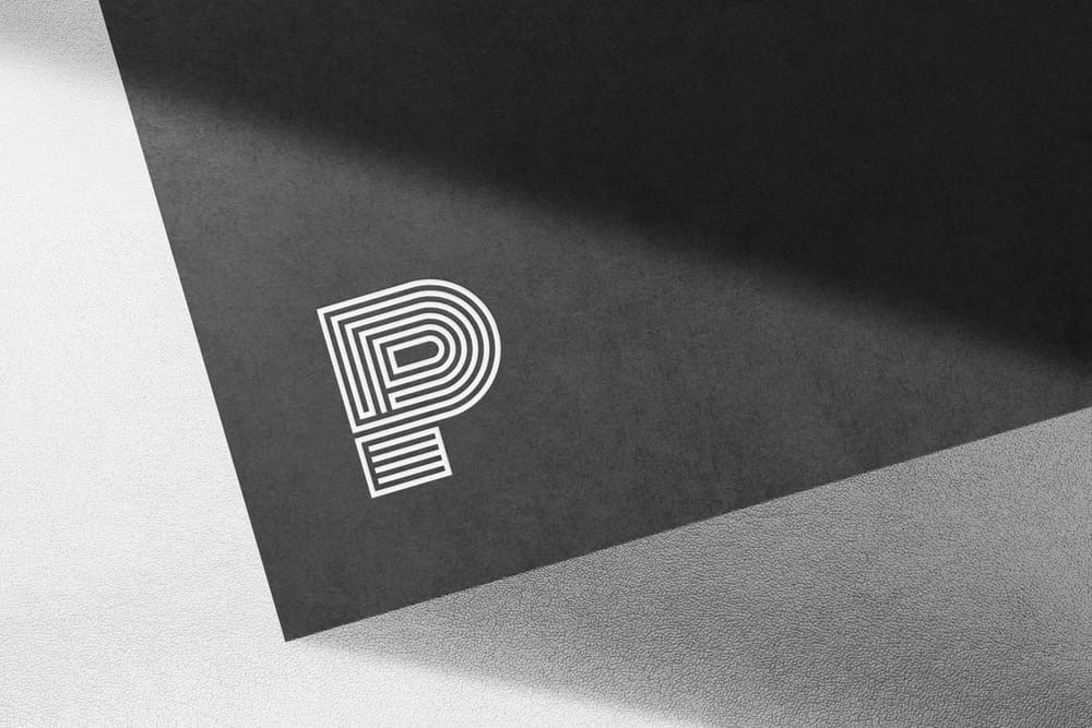 Logo Mockup on Gray Leather Background